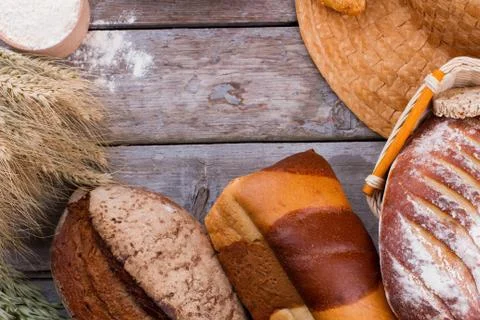 Assorted bread on wooden background. Stock Photos