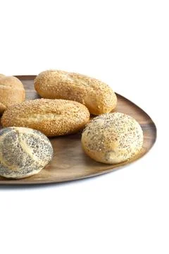 Assorted bread in wooden plate Stock Photos