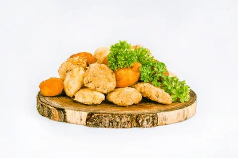 Assorted Breaded Chicken nuggets Fillet with salad on a White Background,food at Stock Photos