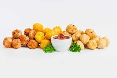 Assorted Breaded Chicken nuggets Fillet with salad on a White Background,food at Foto stock