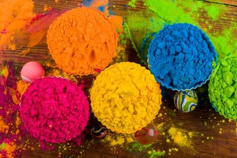 Assorted bright podwer color samples on dark background Stock Photos
