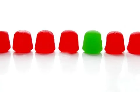 Assorted brightly colored candy gum drops on white Stock Photos