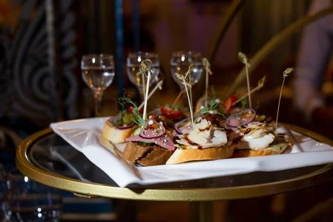 Assorted bruschetta on the buffet table at the event Stock Photos
