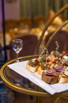 Assorted bruschetta on the buffet table at the event Stock Photos