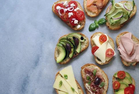 Assorted bruschetta with different fillings Stock Photos