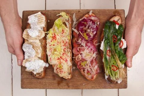 Assorted bruschetta with various toppings. Appetizing bruschetta. Stock-Fotos
