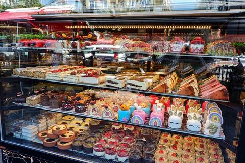 Assorted cakes in a shop-window Stock Photos