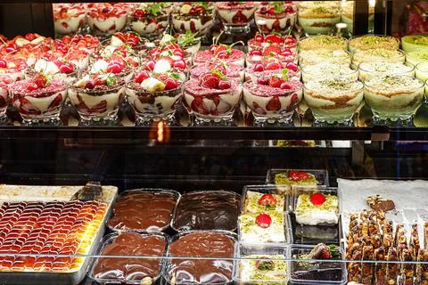 Assorted cakes in a shop-window Stock Photos