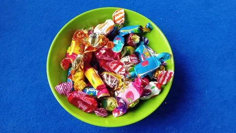 Assorted Candy in Green Bowl Stock Photos