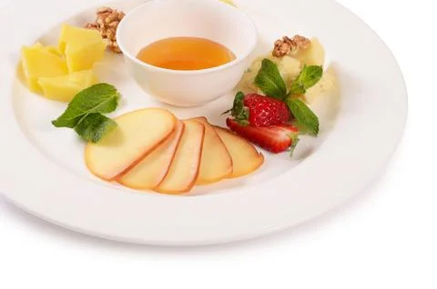 Assorted cheese with honey Stock Photos