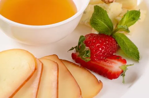Assorted cheese with honey Stock Photos