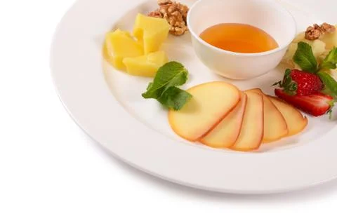 Assorted cheese with honey Stock Photos