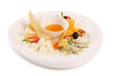 Assorted cheese with honey Stock Photos