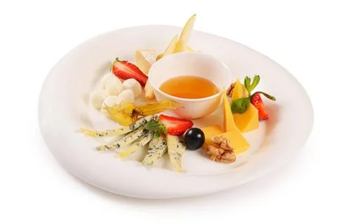 Assorted cheese with honey Stock Photos