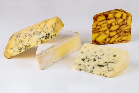 Assorted of cheese on isolated white background. Stock Photos