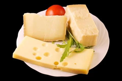 Assorted cheese plate Stock Photos