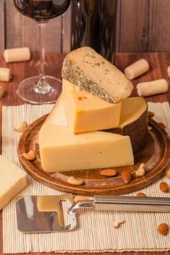 Assorted Cheese Plate with Red Wine, Nuts and Honey Stock Photos