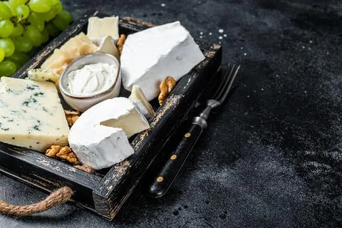 Assorted Cheese platter with Brie, Camembert, Roquefort, parmesan, blue cream Stock Photos