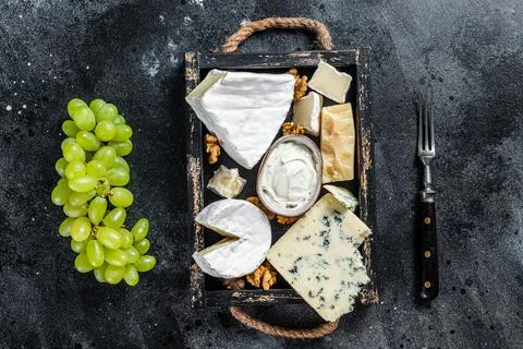 Assorted Cheese platter with Brie, Camembert, Roquefort, parmesan, blue cream Stock Photos