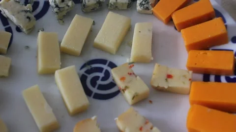 Assorted Cheese Platter with Different Varieties Cubed for Tasting 스톡 동영상 337140093