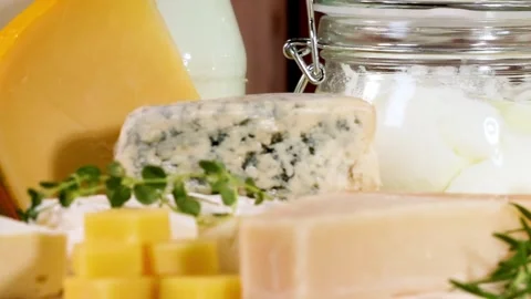 Assorted Cheeses and Dairy Jars on Display Vídeo Stock 307180093