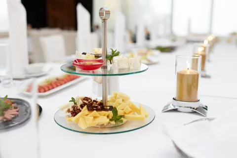 Assorted cheeses on a stand Stock Photos
