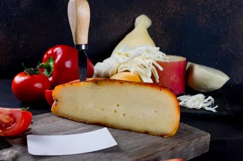 Assorted cheeses in various shapes and sizes Stockfoto's