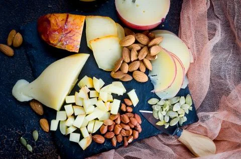 Assorted cheeses in various shapes and sizes Fotos Stock