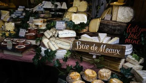 Assorted cheeses: "will you brie mine?" Stock Photos