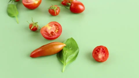 Assorted cherry tomatoes halves seeds and juicy pulp closeup Stock Footage 314417618