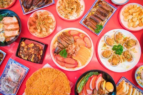 Assorted Chinese Dishes On Red Table Stock Photos