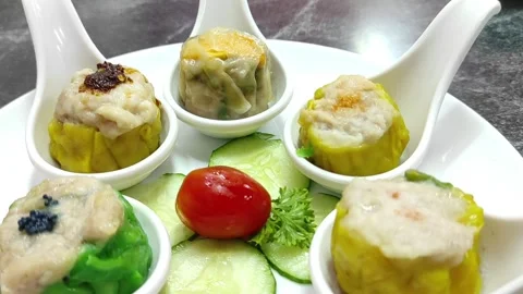 Assorted Chinese dumplings in a nice plating Stock Footage 263573684