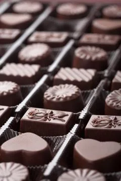 Assorted chocolate candies in box Stock Photos