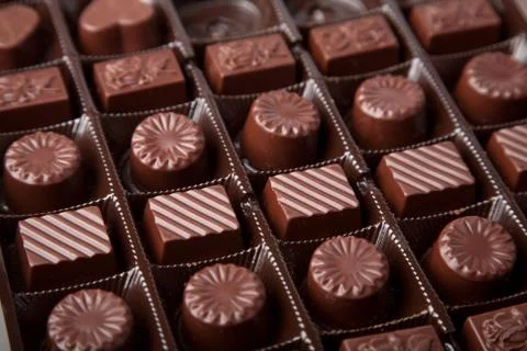 Assorted chocolate candies in box Stock Photos