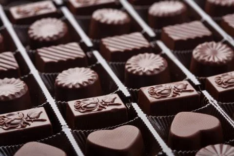 Assorted chocolate candies in box Stock Photos
