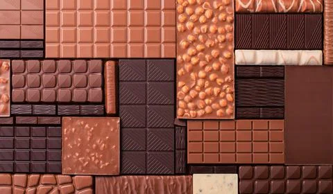 Assorted chocolates, various cocoa bar. Organic food background. Stock Photos