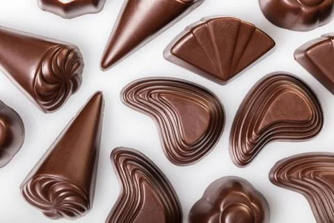 Assorted chocolates on white Stock Photos