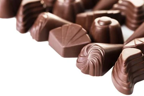 Assorted chocolates on white Stock Photos