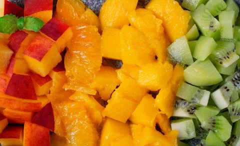 Assorted chopped fruits in rows Stock-Fotos