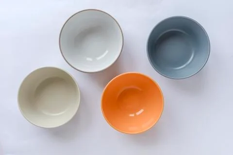 Assorted clean empty bowls and plates for food Foto stock