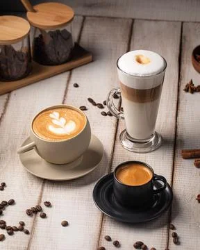 Assorted coffee drinks with foam and espresso Foto stock