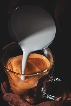 Assorted coffee shop drinks including Arabic coffee, espresso shots, latte art Stock Photos