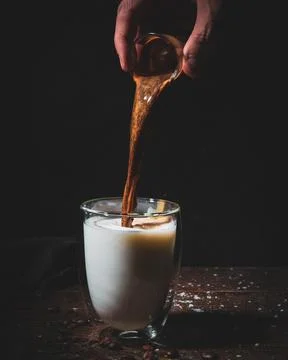 Assorted coffee shop drinks including Arabic coffee, espresso shots, latte art b Stock Photos