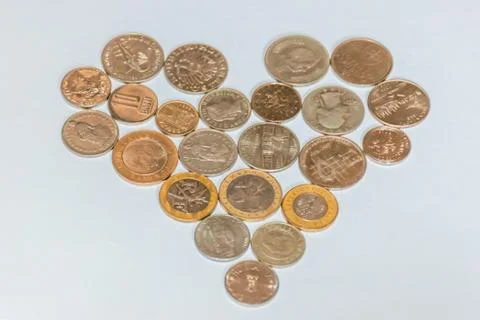 Assorted coins, both old ones which are no longer in circulation and contempo Stock Photos