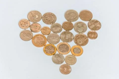 Assorted coins, both old ones which are no longer in circulation and contempo Stock Photos