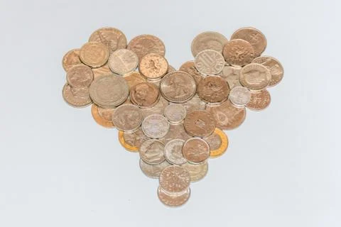 Assorted coins, both old ones which are no longer in circulation and contempo Stock Photos