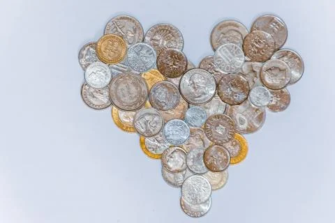 Assorted coins, both old ones which are no longer in circulation and contempo Stock Photos