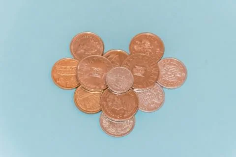 Assorted coins, both old ones which are no longer in circulation and contempo Stock Photos