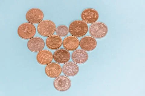 Assorted coins, both old ones which are no longer in circulation and contempo Stock Photos