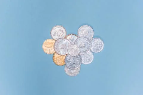 Assorted coins, both old ones which are no longer in circulation and contempo Stock Photos